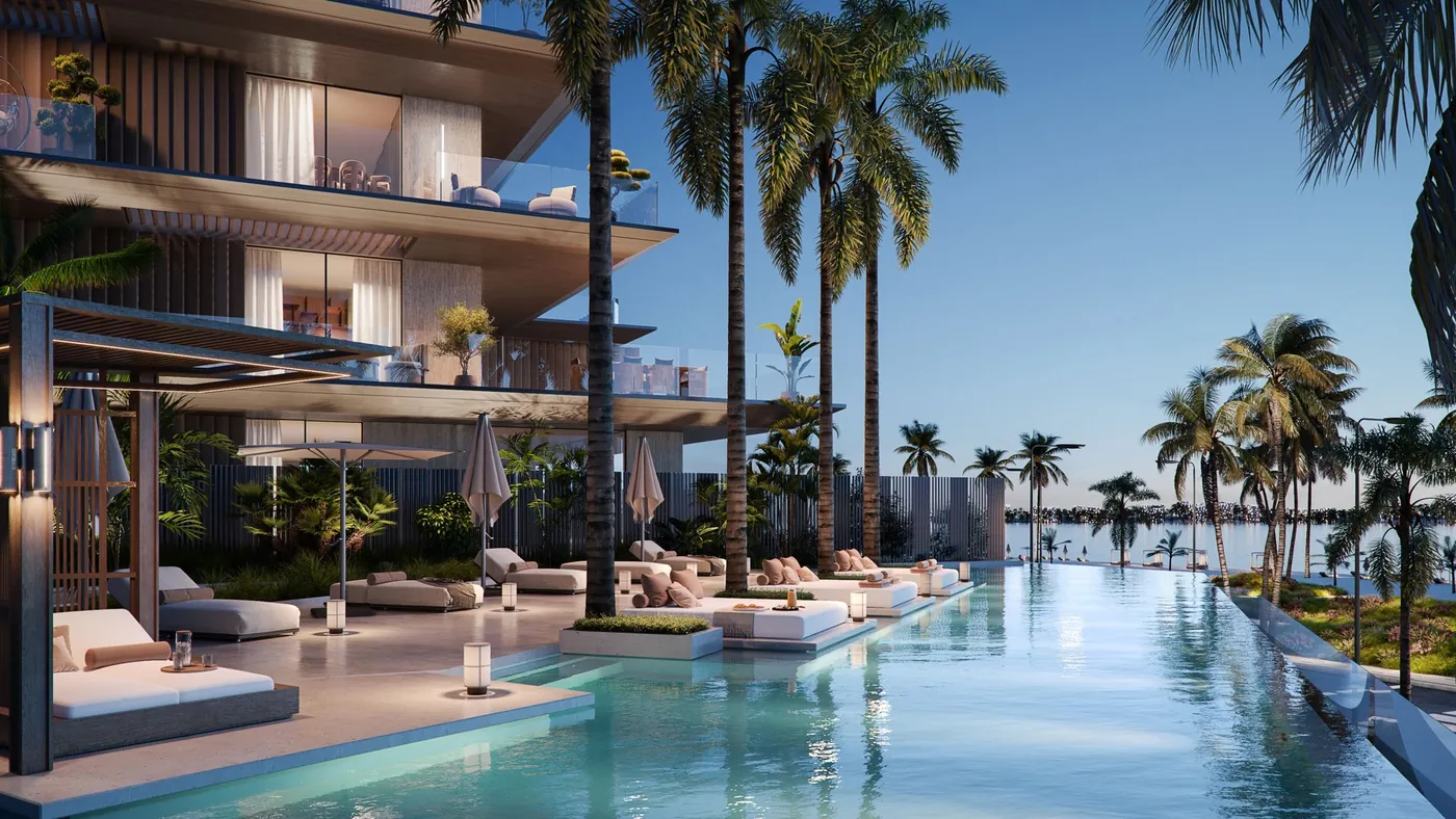 Infinity pool and beachfront — Omoria developer visual